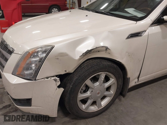 2008 Cadillac CTS AWD w/1SB with VIN 1G6DS57V880139916, listed as a IAAI auction lot 41302359 with 118,078 mi miles. Bid and sale history available at carsss.com. Image 6.