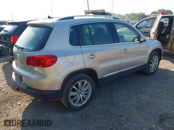 2012 Volkswagen Tiguan SE with VIN WVGBV7AX7CW580259, listed as a IAAI auction lot 42719624 with 94,710 mi miles and . Bid and sale history available at DreamBid. Image 4.