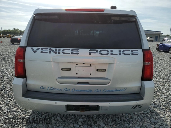 2018 Chevrolet Tahoe Commercial with VIN 1GNLCDEC2JR275159, listed as a Copart auction lot 61337355 with 84,712 mi miles and Salvage title. Bid and sale history available at DreamBid. Image 6.