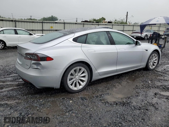 2017 Tesla Model S 100D with VIN 5YJSA1E20HF190126, listed as a Copart auction lot 60087655 with 42,025 mi miles and Salvage title. Bid and sale history available at DreamBid. Image 3.