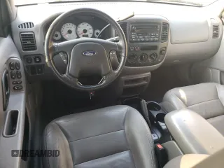 2001 Ford Escape XLT with VIN 1FMCU04141KB40767, listed as a Copart auction lot 71492664 with 118,541 mi miles and Salvage Title. Bid and sale history available at carsss.com. Image 8.