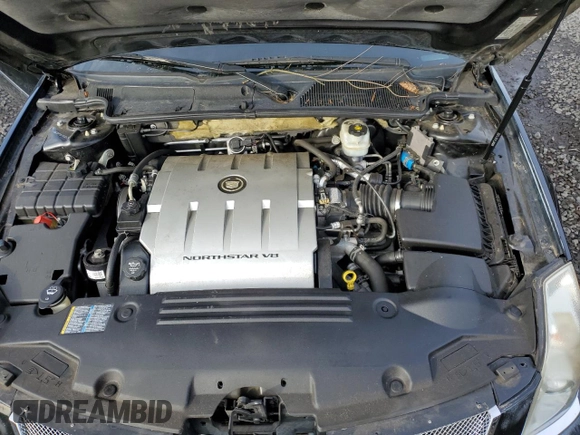 2006 Cadillac DTS 1SD z VIN 1G6KD57Y16U140102, wystawiony jako Copart lot #46145435 z przebiegiem 95 567 mil mil oraz Szkody całkowita. Historia ofert i sprzedaży dostępna na DreamBid. Obrazek 11.