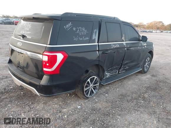 2021 Ford Expedition XLT with VIN 1FMJU1HTXMEA03800, listed as a IAAI auction lot 41248896 with 85,108 mi miles and . Bid and sale history available at DreamBid. Image 4.
