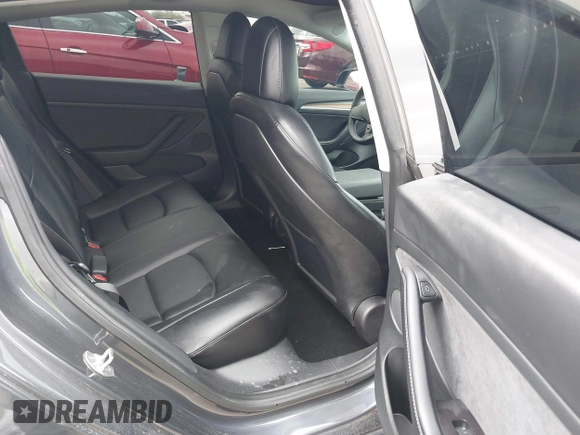 2022 Tesla Model 3 Long Range with VIN 5YJ3E1EB9NF164774, listed as a IAAI auction lot 41915755 with 39,625 mi miles and . Bid and sale history available at DreamBid. Image 8.