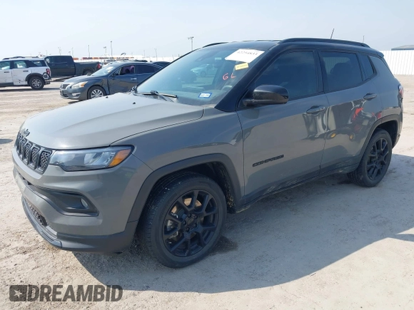 2023 Jeep Compass Latitude with VIN 3C4NJDBN6PT531767, listed as a IAAI auction lot 42254833 with 57,630 mi miles and . Bid and sale history available at DreamBid. Image 2.