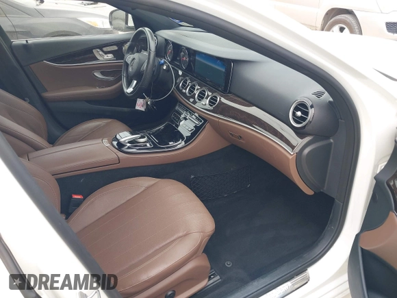 2017 Mercedes-Benz E-Class E 300 Luxury with VIN WDDZF4JB6HA221868, listed as a IAAI auction lot 41916237 with 56,648 mi miles. Bid and sale history available at carsss.com. Image 5.
