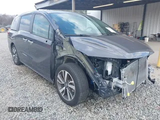 2023 Honda Odyssey Touring with VIN 5FNRL6H86PB065670, listed as a IAAI auction lot 41691093 with 22,518 mi miles and . Bid and sale history available at DreamBid. Image 1.