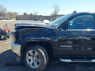 2019 GMC Sierra 1500 SLE z VIN 2GTV2MEC5K1105649, wystawiony jako IAAI lot #42039152 z przebiegiem 68 640 mil mil oraz . Historia ofert i sprzedaży dostępna na DreamBid. Obrazek 6.