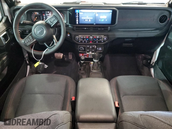 2024 Jeep Wrangler Rubicon with VIN 1C4PJXFG8RW366212, listed as a Copart auction lot 88892985 with 7,649 mi miles and Salvage Title. Bid and sale history available at DreamBid. Image 8.