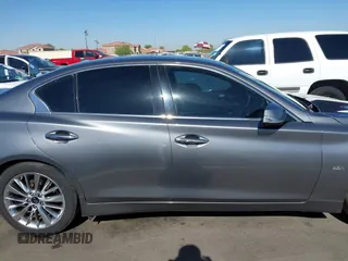 2017 Infiniti Q50 Premium z VIN JN1EV7AP5HM733602, wystawiony jako IAAI lot #42334405 z przebiegiem 174 058 mil mil oraz . Historia ofert i sprzedaży dostępna na DreamBid. Obrazek 13.