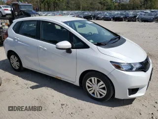 2015 Honda Fit LX with VIN 3HGGK5H58FM770833, listed as a Copart auction lot 54829065 with 119,923 mi miles and Clean Title. Bid and sale history available at carsss.com. Image 4.