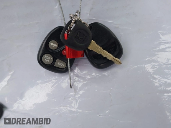 1999 Saturn SC z VIN 1G8ZY1271XZ276834, wystawiony jako IAAI lot #41445985 z przebiegiem 62 428 mil mil oraz . Historia ofert i sprzedaży dostępna na DreamBid. Obrazek 11.