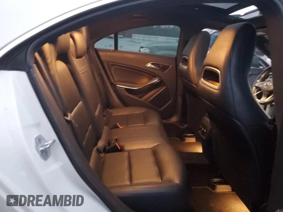 2015 Mercedes-Benz CLA 250 with VIN WDDSJ4EB5FN165731, listed as a Copart auction lot 38870284 with 100,739 mi miles and . Bid and sale history available at DreamBid. Image 10.