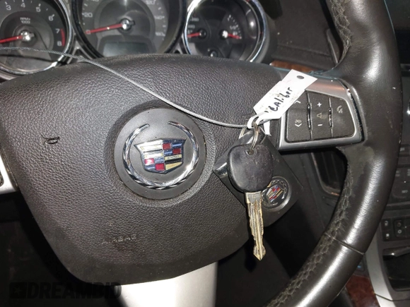 2012 Cadillac CTS Luxury with VIN 1G6DE5E59C0103526, listed as a IAAI auction lot 42200175 with 181,023 mi miles and . Bid and sale history available at DreamBid. Image 11.