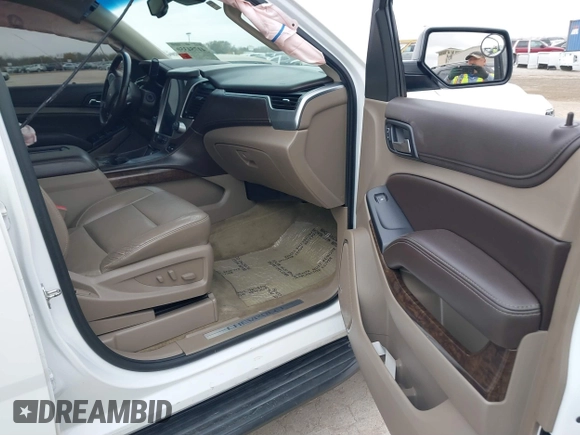 2015 Chevrolet Tahoe LT with VIN 1GNSCBKC4FR530776, listed as a IAAI auction lot 41754350 with 174,694 mi miles and . Bid and sale history available at DreamBid. Image 5.