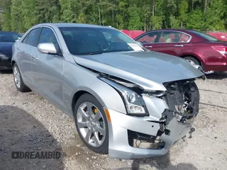 2014 Cadillac ATS Luxury RWD with VIN 1G6AB5RX5E0125646, listed as a IAAI auction lot 42084515 with 77,372 mi miles and . Bid and sale history available at DreamBid. Image 1.
