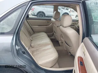 2004 Toyota Avalon XL with VIN 4T1BF28B94U387764, listed as a IAAI auction lot 42162419 with 306,611 mi miles and . Bid and sale history available at carsss.com. Image 8.