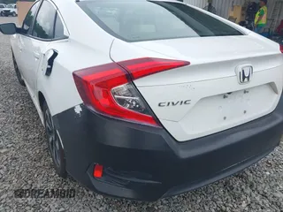 2017 Honda Civic LX with VIN 19XFC2F58HE010262, listed as a IAAI auction lot 42118124 with 125,535 mi miles and . Bid and sale history available at DreamBid. Image 6.