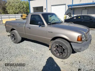 2003 Ford Ranger XL with VIN 1FTYR10D53PA62295, listed as a Copart auction lot 49323375 with 214,131 mi miles and Salvage Title. Bid and sale history available at DreamBid. Image 4.