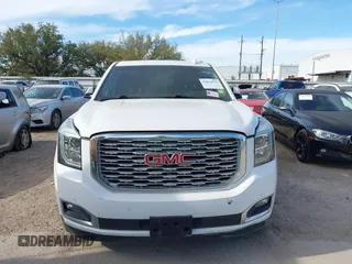 2019 GMC Yukon XL Denali with VIN 1GKS1HKJ8KR378385, listed as a IAAI auction lot 41824529 with 115,481 mi miles. Bid and sale history available at carsss.com. Image 12.