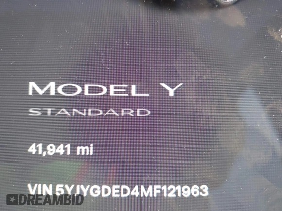 2021 Tesla Model Y Standard Range z VIN 5YJYGDED4MF121963, wystawiony jako IAAI lot #41490477 z przebiegiem 41 941 mil mil oraz . Historia ofert i sprzedaży dostępna na DreamBid. Obrazek 7.