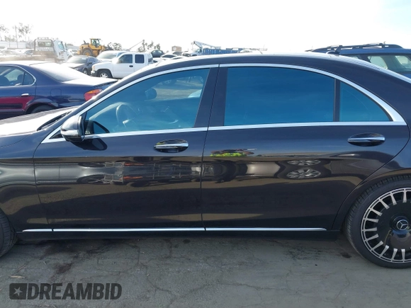 2018 Mercedes-Benz S 560 with VIN WDDUG8DB0JA385097, listed as a IAAI auction lot 41384874 with 76,423 mi miles and . Bid and sale history available at carsss.com. Image 14.