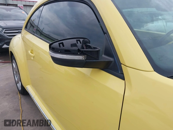 2013 Volkswagen Beetle 2.5L with VIN 3VWHX7AT7DM604449, listed as a IAAI auction lot 42406666 with 104,874 mi miles and . Bid and sale history available at DreamBid. Image 6.
