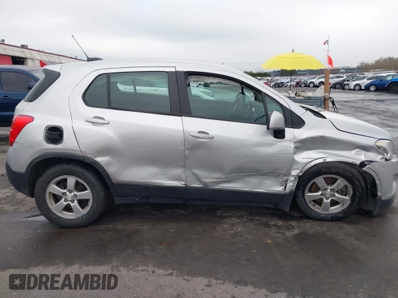 2015 Chevrolet Trax LS with VIN 3GNCJPSBXFL256473, listed as a IAAI auction lot 41130809 with 106,923 mi miles and . Bid and sale history available at DreamBid. Image 13.