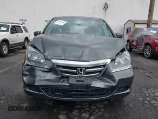 2007 Honda Odyssey EX-L z VIN 5FNRL386X7B445642, wystawiony jako IAAI lot #40652844 z przebiegiem 202 622 mil mil oraz . Historia ofert i sprzedaży dostępna na DreamBid. Obrazek 12.