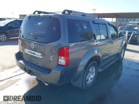2005 Nissan Pathfinder SE with VIN 5N1AR18U45C751529, listed as a IAAI auction lot 41009894 with 167,023 mi miles. Bid and sale history available at carsss.com. Image 4.