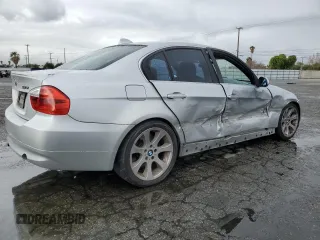 2007 BMW 3 Series 335i with VIN WBAVB73527KY60722, listed as a Copart auction lot 48382075 with 164,453 mi miles and Salvage Title. Bid and sale history available at carsss.com. Image 3.