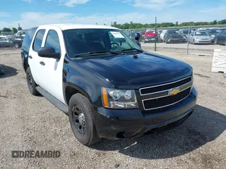 2012 Chevrolet Tahoe Commercial z VIN 1GNLC2E05CR320494, wystawiony jako IAAI lot #42838775 z przebiegiem 120 139 mil mil oraz . Historia ofert i sprzedaży dostępna na DreamBid. Obrazek 1.