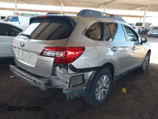 2015 Subaru Outback Premium with VIN 4S4BSACC0F3325927, listed as a IAAI auction lot 42450142 with 140,566 mi miles and . Bid and sale history available at DreamBid. Image 4.