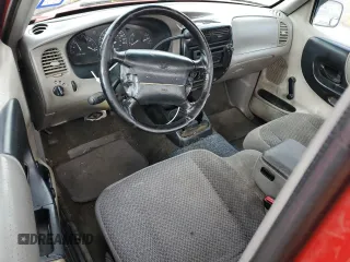 1999 Ford Ranger XL with VIN 1FTYR10V5XUB71629, listed as a Copart auction lot 84675534 with 180,219 mi miles and Salvage Title. Bid and sale history available at carsss.com. Image 8.