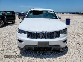 2019 Jeep Grand Cherokee Laredo E with VIN 1C4RJEAG0KC603870, listed as a Copart auction lot 60142575 with Not provided miles and Salvage title. Bid and sale history available at DreamBid. Image 5.