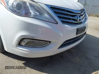 2013 Hyundai Azera с VIN KMHFH4JG0DA329329, выставлен на аукционе IAAI как лот 42539047 с пробегом 105 434 миль миль и . История ставок и продаж доступна на DreamBid. Изображение 14.