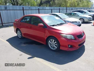 2009 Toyota Corolla with VIN 1NXBU40E09Z098951, listed as a IAAI auction lot 42090512 with 199,787 mi miles. Bid and sale history available at carsss.com. Image 1.