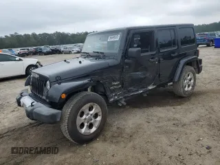 2015 Jeep Wrangler Unlimited Sahara z VIN 1C4BJWEG0FL703927, wystawiony jako Copart lot #58699505 z przebiegiem 120 441 mil mil oraz Szkoda całkowita • Salvage title. Historia ofert i sprzedaży dostępna na DreamBid. Obrazek 1.