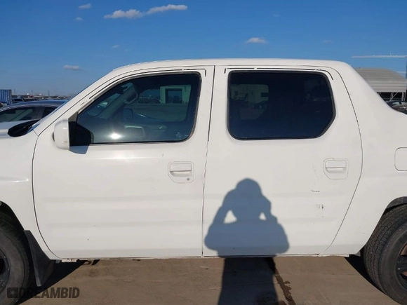 2013 Honda Ridgeline RTL with VIN 5FPYK1F58DB015799, listed as a IAAI auction lot 41498052 with 104,372 mi miles. Bid and sale history available at carsss.com. Image 14.