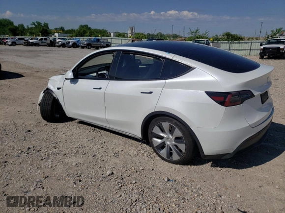 2023 Tesla Model Y Long Range with VIN 7SAYGDEE6PF861451, listed as a Copart auction lot 53133854 with 7,216 mi miles and Salvage Title. Bid and sale history available at DreamBid. Image 2.