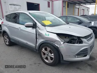 2015 Ford Escape SE with VIN 1FMCU0G95FUC81490, listed as a IAAI auction lot 42136791 with 140,967 mi miles. Bid and sale history available at carsss.com. Image 1.