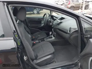 2017 Ford Fiesta SE with VIN 3FADP4BJ7HM137543, listed as a IAAI auction lot 41555369 with 141,780 mi miles. Bid and sale history available at carsss.com. Image 5.