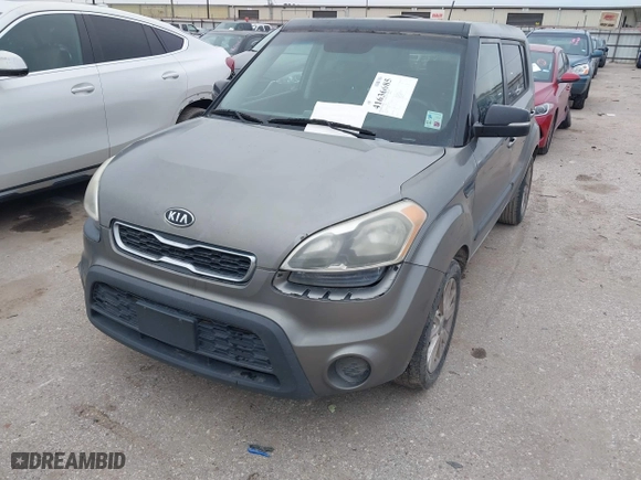 2012 Kia Soul + with VIN KNDJT2A66C7412428, listed as a IAAI auction lot 41636685 with 165,512 mi miles. Bid and sale history available at carsss.com. Image 2.