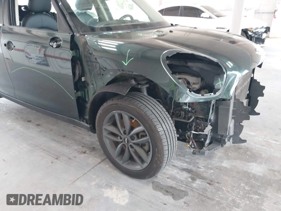2013 MINI Countryman S with VIN WMWZC3C56DWP24170, listed as a IAAI auction lot 42366594 with 143,311 mi miles and . Bid and sale history available at DreamBid. Image 6.