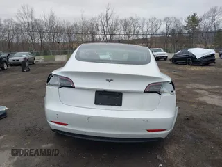 2020 Tesla Model 3 Standard Range Plus with VIN 5YJ3E1EA7LF659172, listed as a IAAI auction lot 42017026 with 32,104 mi miles. Bid and sale history available at carsss.com. Image 16.
