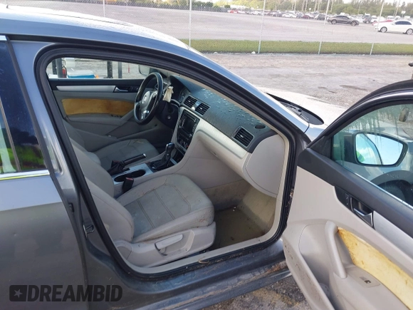 2013 Volkswagen Passat SE w/Sunroof & Nav with VIN 1VWBP7A35DC038217, listed as a IAAI auction lot 41944193 with 102,767 mi miles. Bid and sale history available at carsss.com. Image 5.