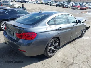 2018 BMW 4 Series 440i with VIN WBA4J5C51JBF07174, listed as a IAAI auction lot 41532904 with 63,745 mi miles and . Bid and sale history available at DreamBid. Image 4.