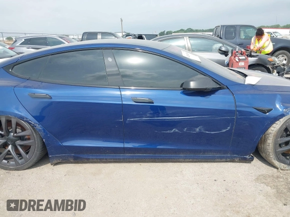 2021 Tesla Model S Plaid with VIN 5YJSA1E64MF442036, listed as a IAAI auction lot 42141304 with 24,998 mi miles and . Bid and sale history available at DreamBid. Image 12.