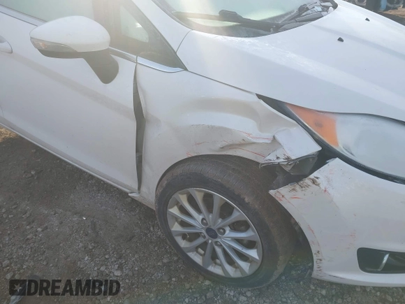 2017 Ford Fiesta Titanium with VIN 3FADP4FJ8HM112435, listed as a IAAI auction lot 41005143 with 75,144 mi miles and . Bid and sale history available at DreamBid. Image 6.
