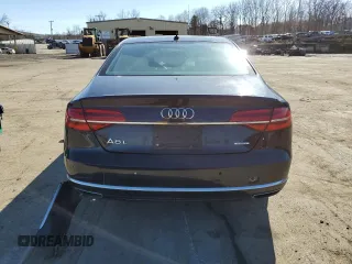 2015 Audi A8 3.0T z VIN WAU3GAFD3FN021393, wystawiony jako Copart lot #46236194 z przebiegiem 58 015 mil mil oraz Szkoda całkowita • Salvage title. Historia ofert i sprzedaży dostępna na DreamBid. Obrazek 6.